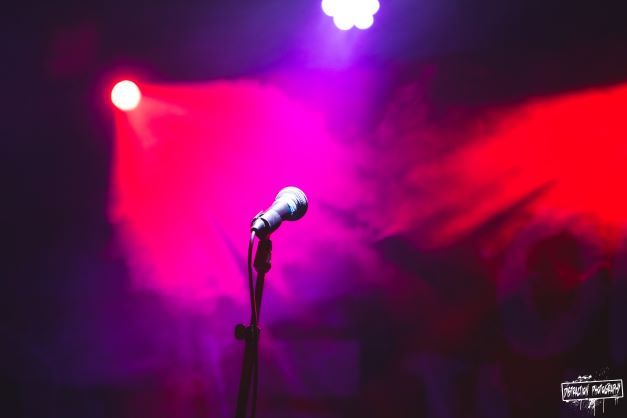 karoake dance party empty microphone on stage